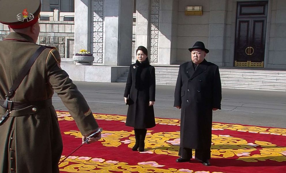 PHOTO: North Korean leader Kim Jong Un, right, and his wife Ri Sol Ju, left, as they attend a military parade in Kim Il Sung Square in Pyongyang, Feb. 8, 2018. The parade was to mark the 70th anniversary of its armed forces.