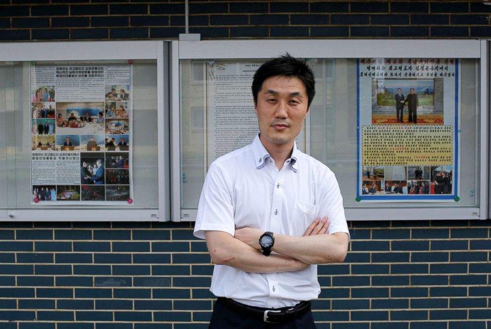 PHOTO: Ryom Mun Song, an associate Professor of Korea University and ethnic Korean in Japan, poses in front of a display at Korea University in Kodaira, west of Tokyo, June 2, 2018.