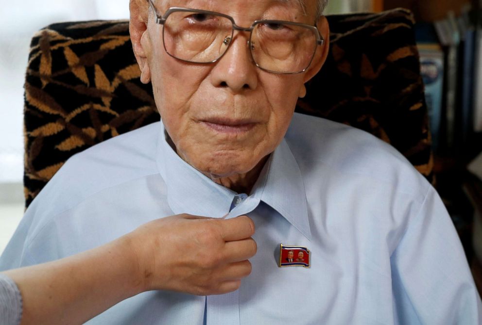 PHOTO: Baek Chong Won, 95, an ethnic North Korean living in Japan, wears the badges of former North Korean leaders Kim Il Sung and Kim Jong Il on his shirt, at his house in Tokyo, Japan, May 27, 2018.