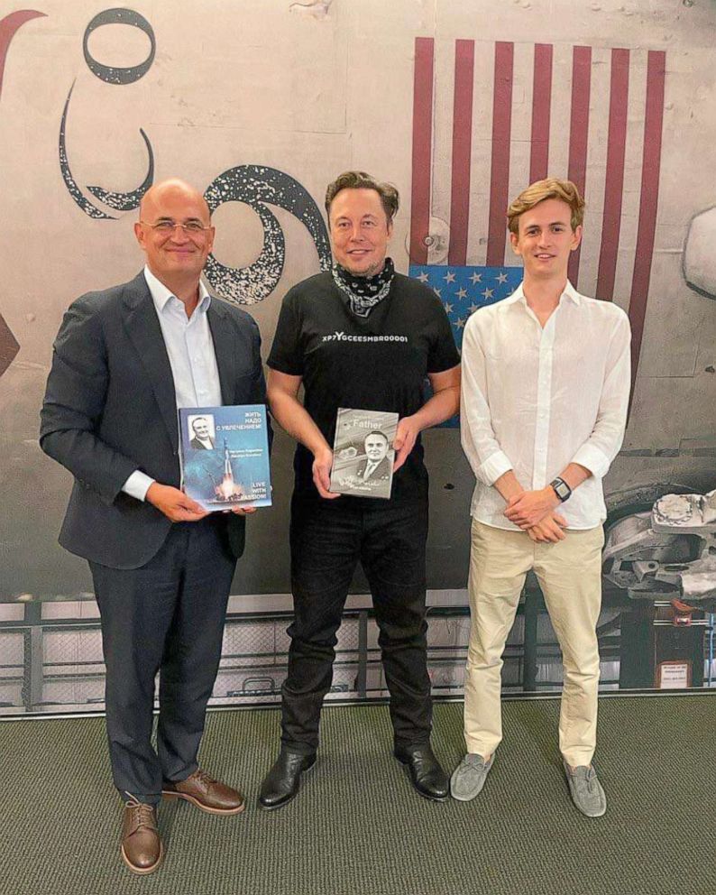 PHOTO: Elon Musk poses with Andrey Korolev and his son during their visit to SpaceX in California, on Sept., 2021.