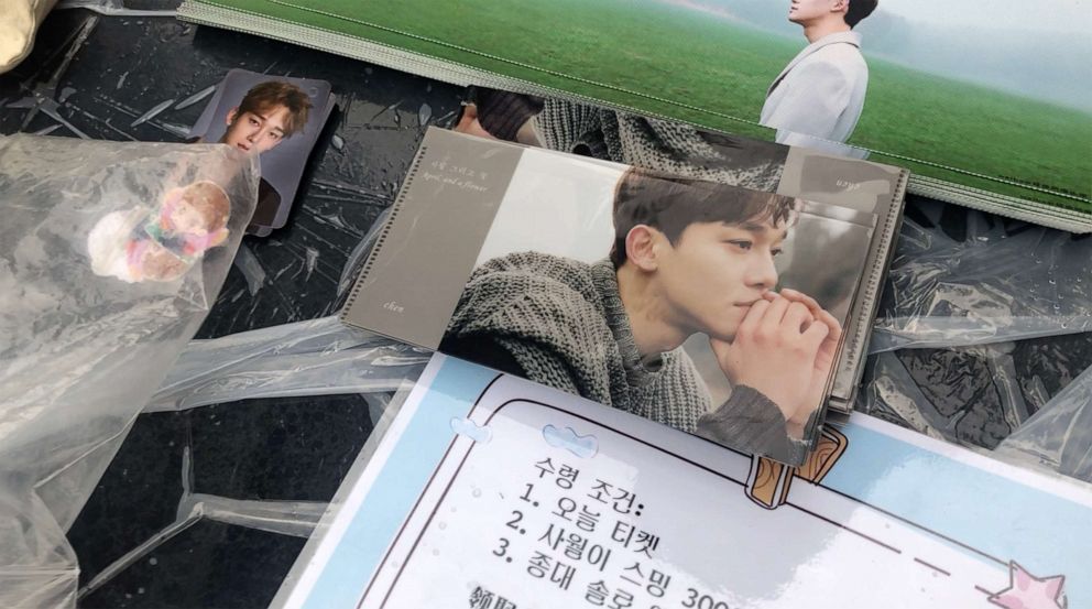 PHOTO: Passionate EXO fans hand out slogans and pictures of the idol boyband they prepared themselves, in front of the concert venue in Seoul, South Korea. 