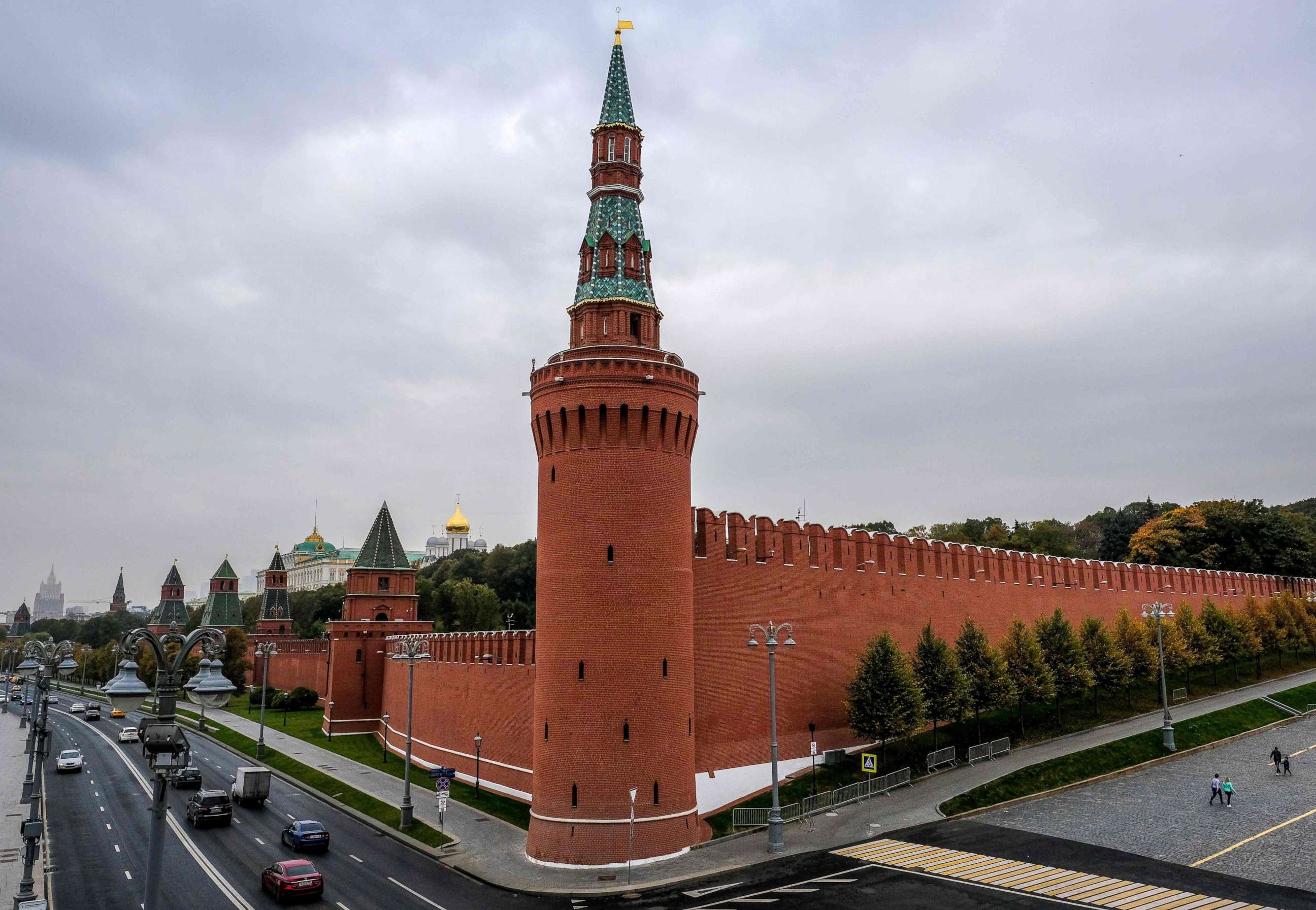 PHOTO: People walk near the Kremlin wall in central Moscow on Oct. 13, 2020.