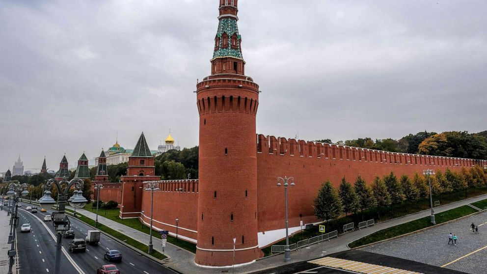 PHOTO: People walk near the Kremlin wall in central Moscow on Oct. 13, 2020.