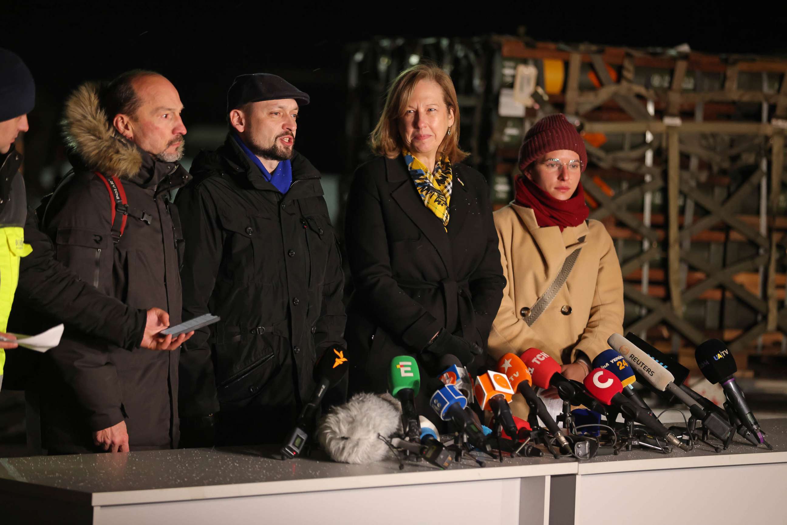 PHOTO: U.S. Embassy Charge d'Affaires Kristina Kvien (2nd from right) and Ukrainian Deputy Defense Minister Rostyslav Zamlynskii speak to the media at Boryspil Airport near Kyiv, Ukraine, Jan. 25, 2022.