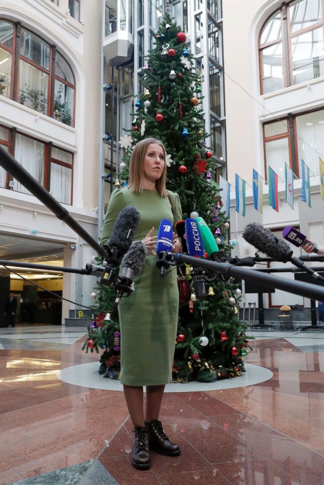 PHOTO: Russian TV host Ksenia Sobchak talks to media as she visits the Russian Central Election Commission in Moscow, Dec. 25, 2017, to submit documents for her registration as a presidential candidate.