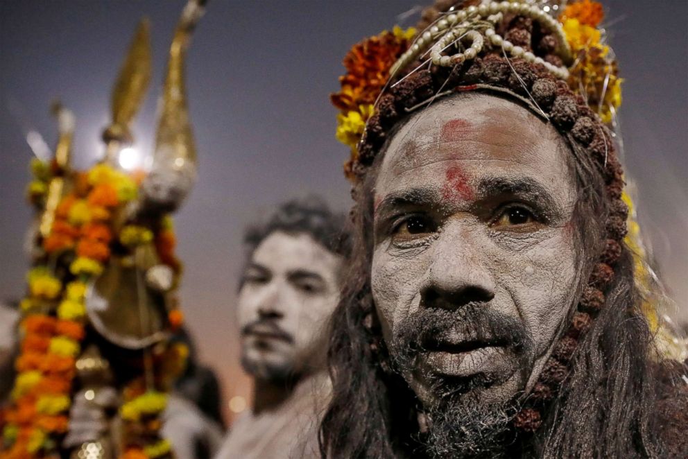 PHOTO: Naga Sadhus or Hindu holy men leave after taking a dip during the first "Shahi Snan" during "Kumbh Mela" or the Pitcher Festival, in Prayagraj, previously known as Allahabad, India, Jan. 15, 2019.