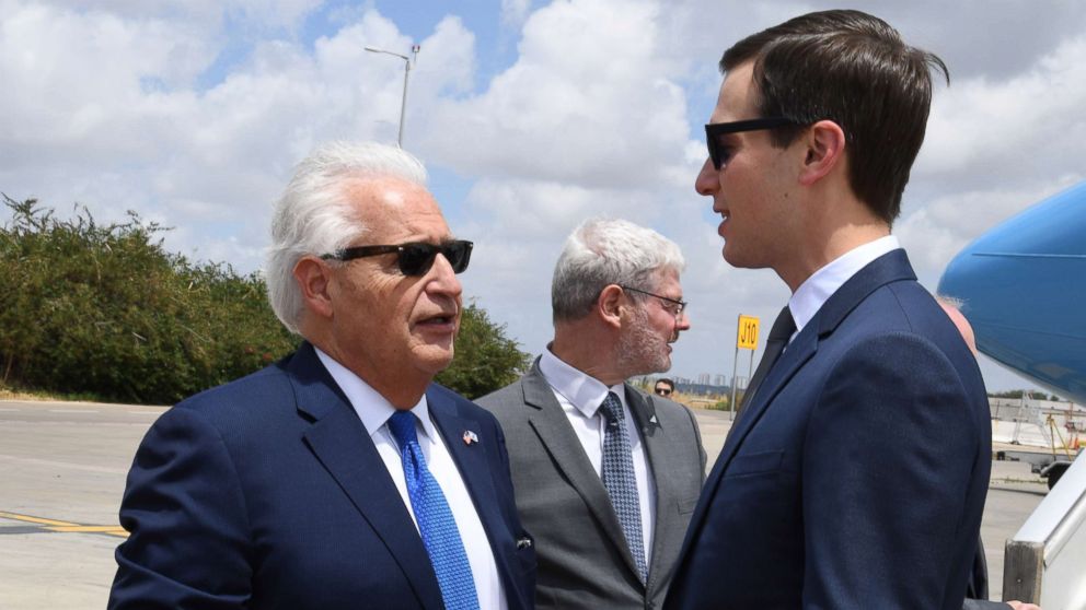 PHOTO: A handout photo made available by the US embassy in Tel Aviv shows US Ambassador to Israel David Friedman, left welcoming Jared Kushner upon arrival near Lod, Israel, May 13, 2018.