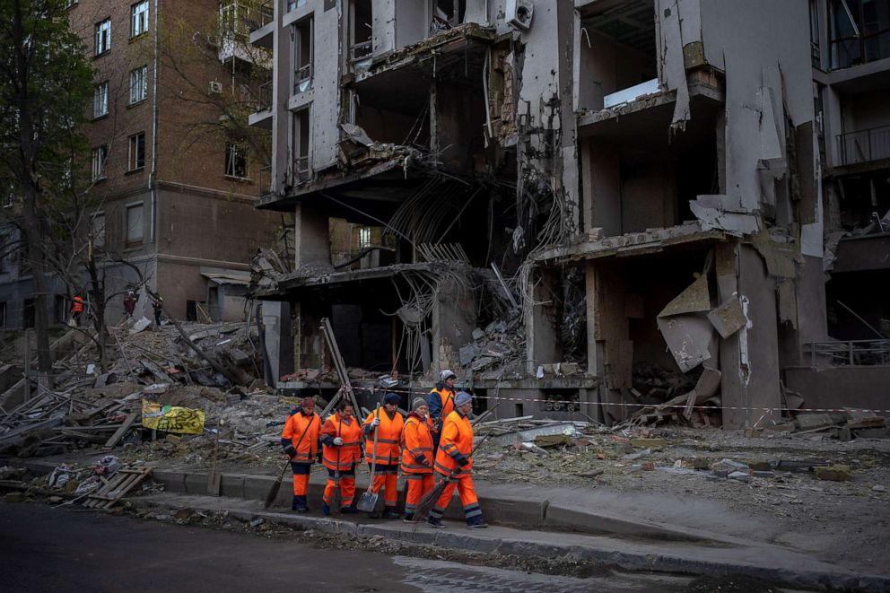PHOTO: Clean-up crews prepare to work at the site of an explosion in Kyiv, Ukraine, on April 29, 2022.