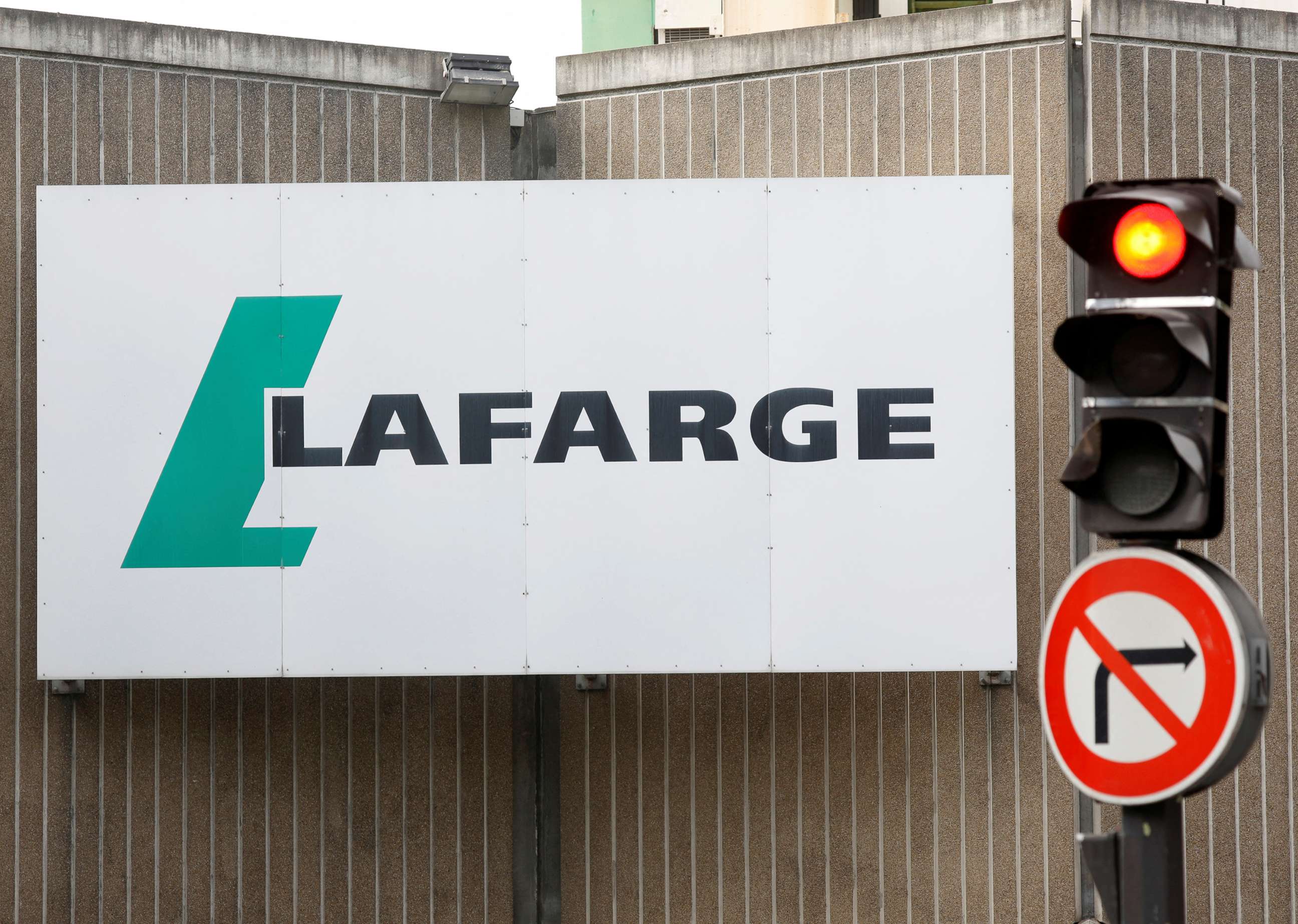 PHOTO: The logo of French concrete maker Lafarge is seen on the plant of Bercy on the banks of the river Seine in Paris, France, Sept. 3, 2020. 