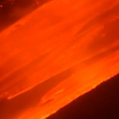 Italy's Mount Etna volcano was spewing molten lava during an eruption.