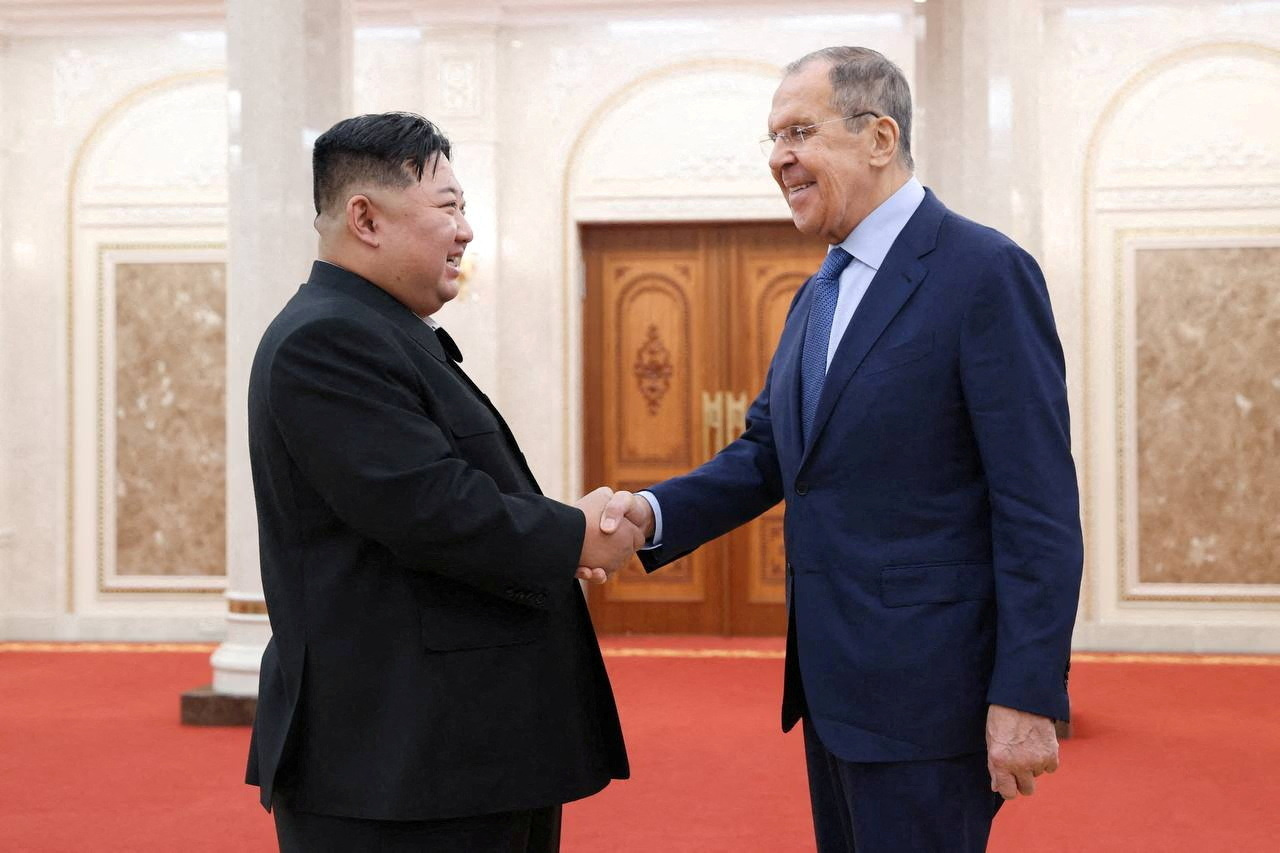 PHOTO: North Korean leader Kim Jong Un shakes hands with Russian Foreign Minister Sergei Lavrov during a meeting in Pyongyang, North Korea, October 19, 2023.