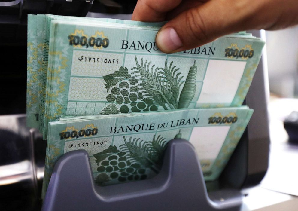 PHOTO: Lebanese pound banknotes are seen at a currency exchange shop in Beirut, Lebanon June 15, 2020.
