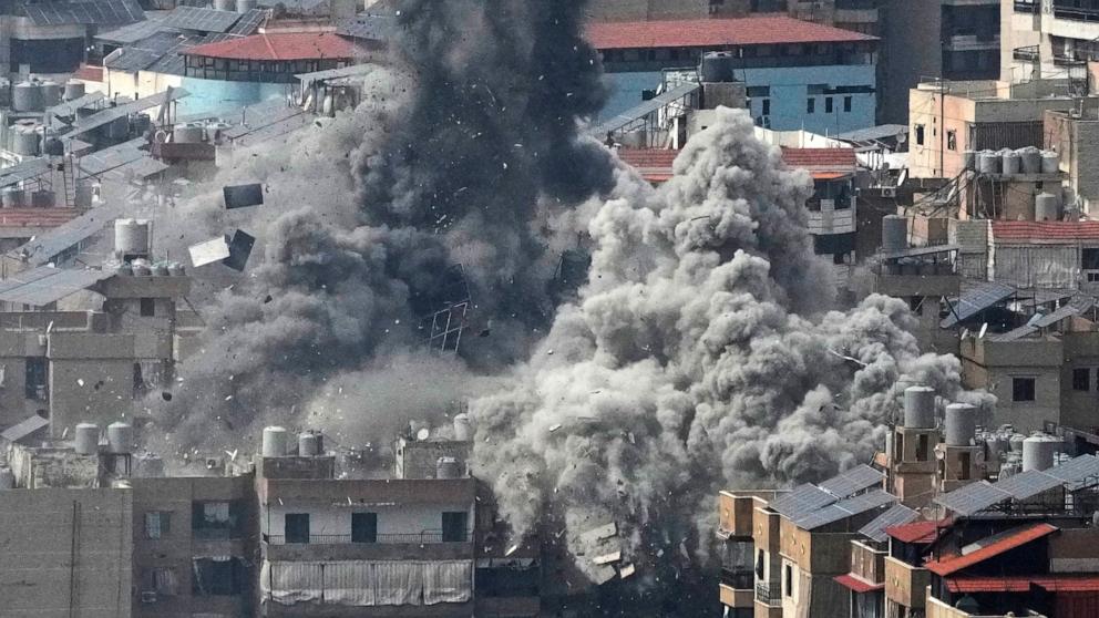 PHOTO: Smoke rises following an Israeli airstrike in Dahiyeh, Beirut's southern suburbs, Friday, March 6, 2026. 