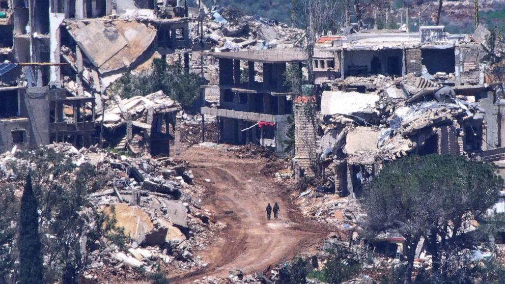 PHOTO: Two Israeli soldiers operate in southern Lebanon, as seen from northern Israel, Wednesday, April 29, 2026. 