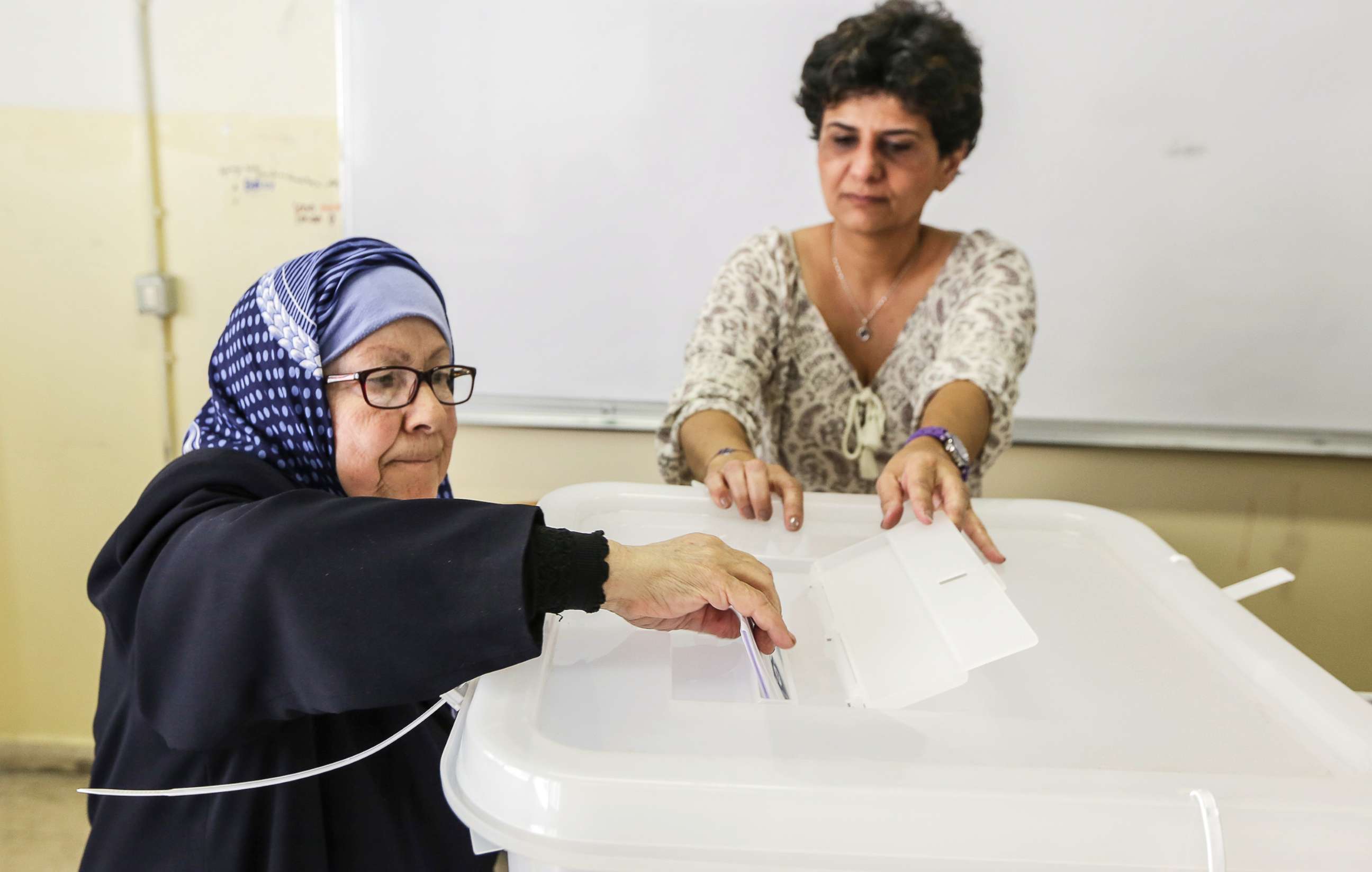 PHOTO: A Lebanese woman casts her vote at a ballot station in Baabda, south east Beirut, Lebanon, May 06, 2018.