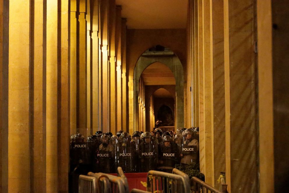 PHOTO: Riot police stand guard during clashes with anti-government protesters, during ongoing protests against the political elites who have ruled the country for decades, in Beirut, Jan. 19, 2020. 