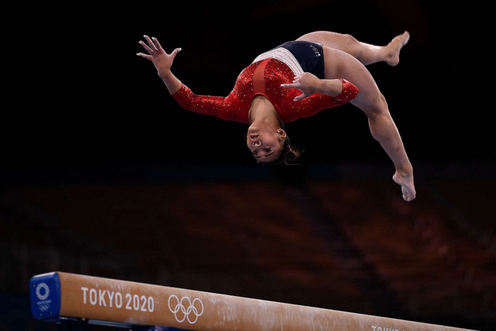 PHOTO: USA's Sunisa Lee competes in the balance beam event of the artistic gymnastics women's team final during the Tokyo 2020 Olympic Games at the Ariake Gymnastics Centre in Tokyo on July 27, 2021.