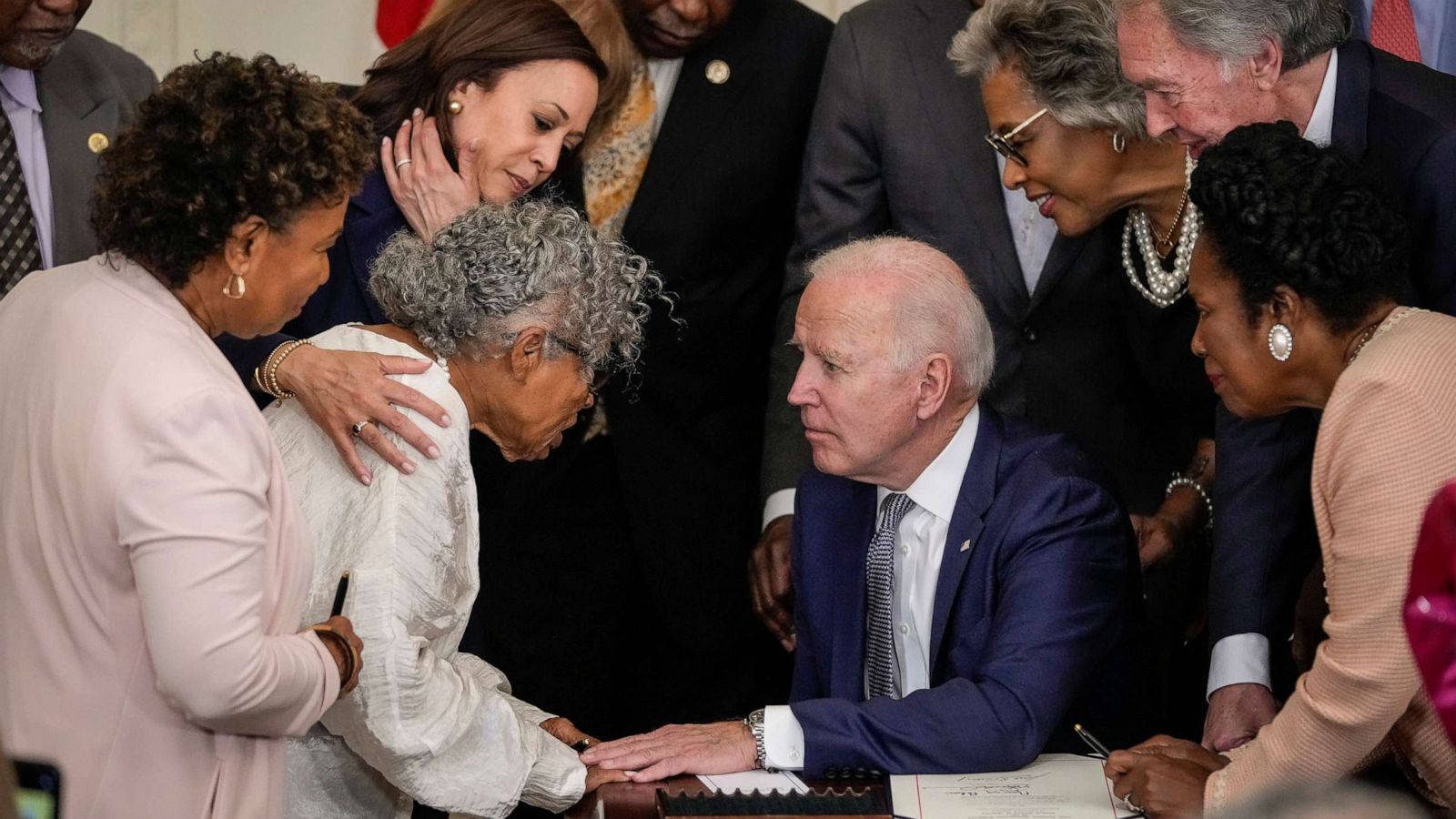 PHOTO: Ninety-four-year-old activist and retired educator Opal Lee speaks with President Joe Biden after he signed the Juneteenth National Independence Day Act into law in the East Room of the White House, June 17, 2021, in Washington.