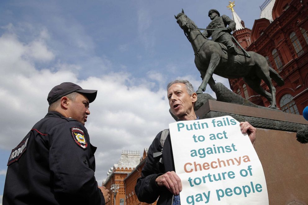 PHOTO: British gay rights activist Peter Tatchell stages an anti-Putin protest against the mistreatment of LGBT people in Russia in front of a monument to Soviet Marshal Georgy Zhukov on Manezhnaya Square in Moscow on June 14, 2018.