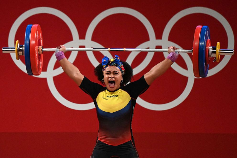 PHOTO: Ecuador's Neisi Patricia Dajomes Barrera competes in the women's 76kg weightlifting competition during the Tokyo 2020 Olympic Games at the Tokyo International Forum in Tokyo on Aug. 1, 2021.