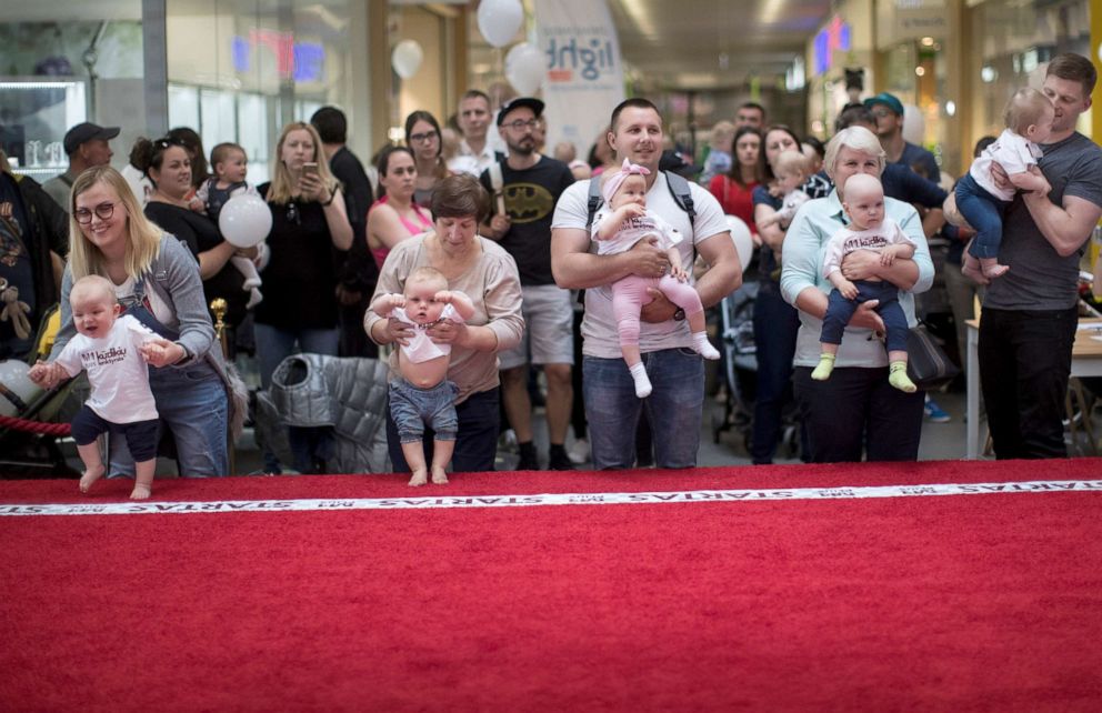 PHOTO: Parents prepare to release their babies during the Baby Race event to mark international Children's Day in Vilnius, Lithuania, June 1, 2019.