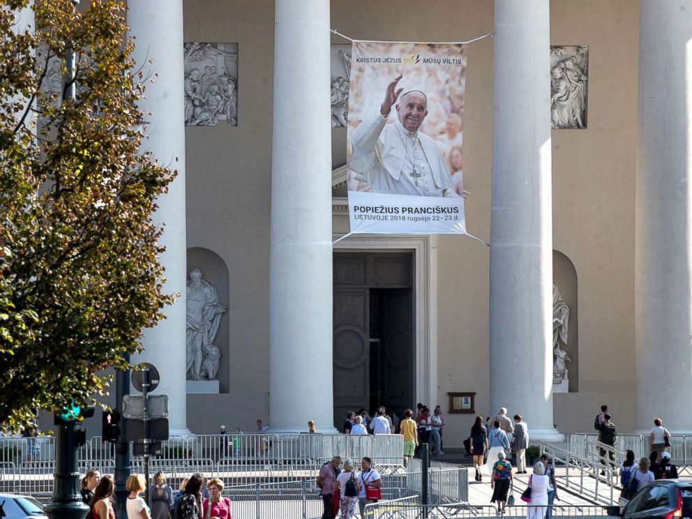 PHOTO: A photo of Pope Francis is hung in front of the Cathedral Basilica of St Stanislaus and St Ladislaus in Vilnius, Lithuania, Sept. 21, 2018, ahead of Pope Francis upcoming visit to Lithuania.