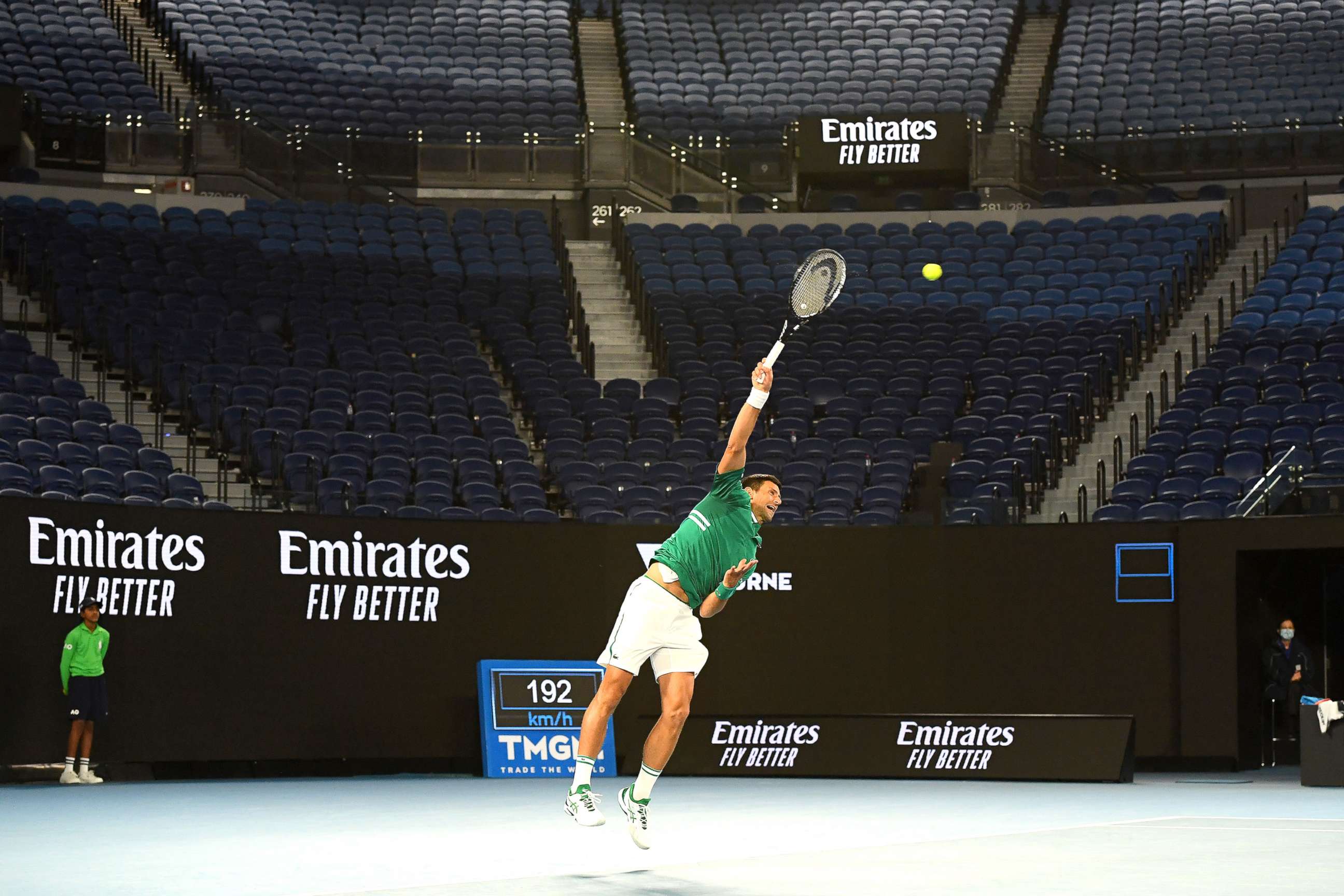 PHOTO: Novak Djokovic of Serbia serves in front of an empty stand in his Men's Singles third round match against Taylor Fritz of the United States during day five of the 2021 Australian Open at Melbourne Park on Feb. 12, 2021 in Melbourne, Australia.