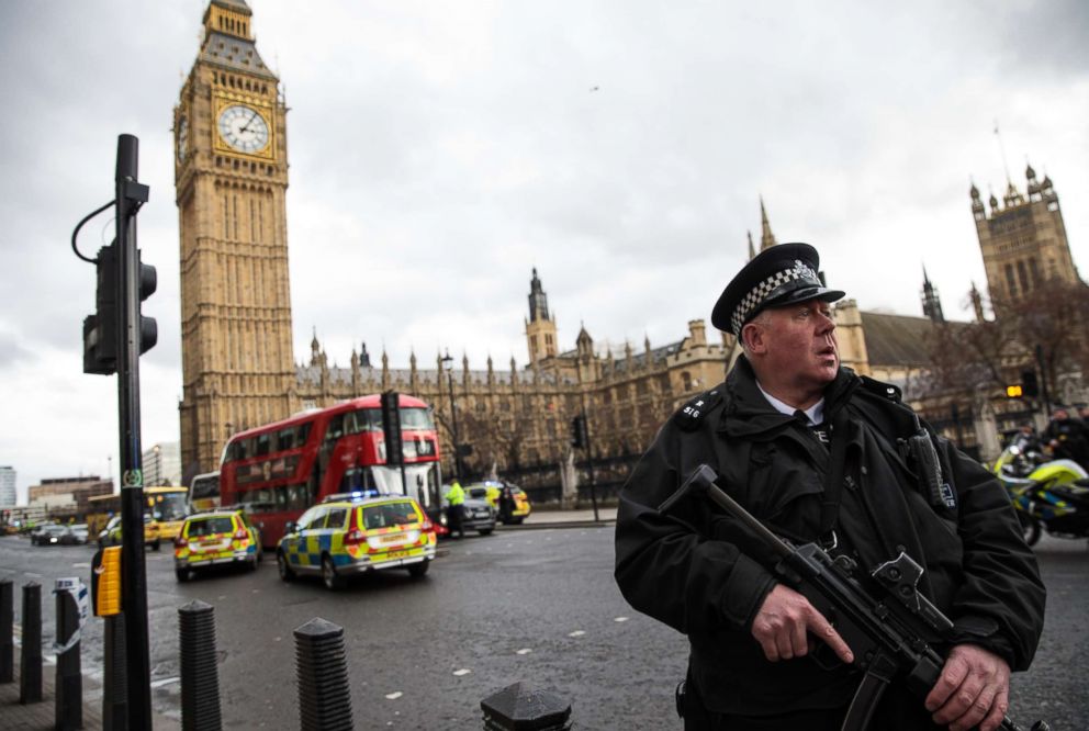 PHOTO: An armed police officer stands guard near Westminster Bridge and the Houses of Parliament on March 22, 2017 in London, England.