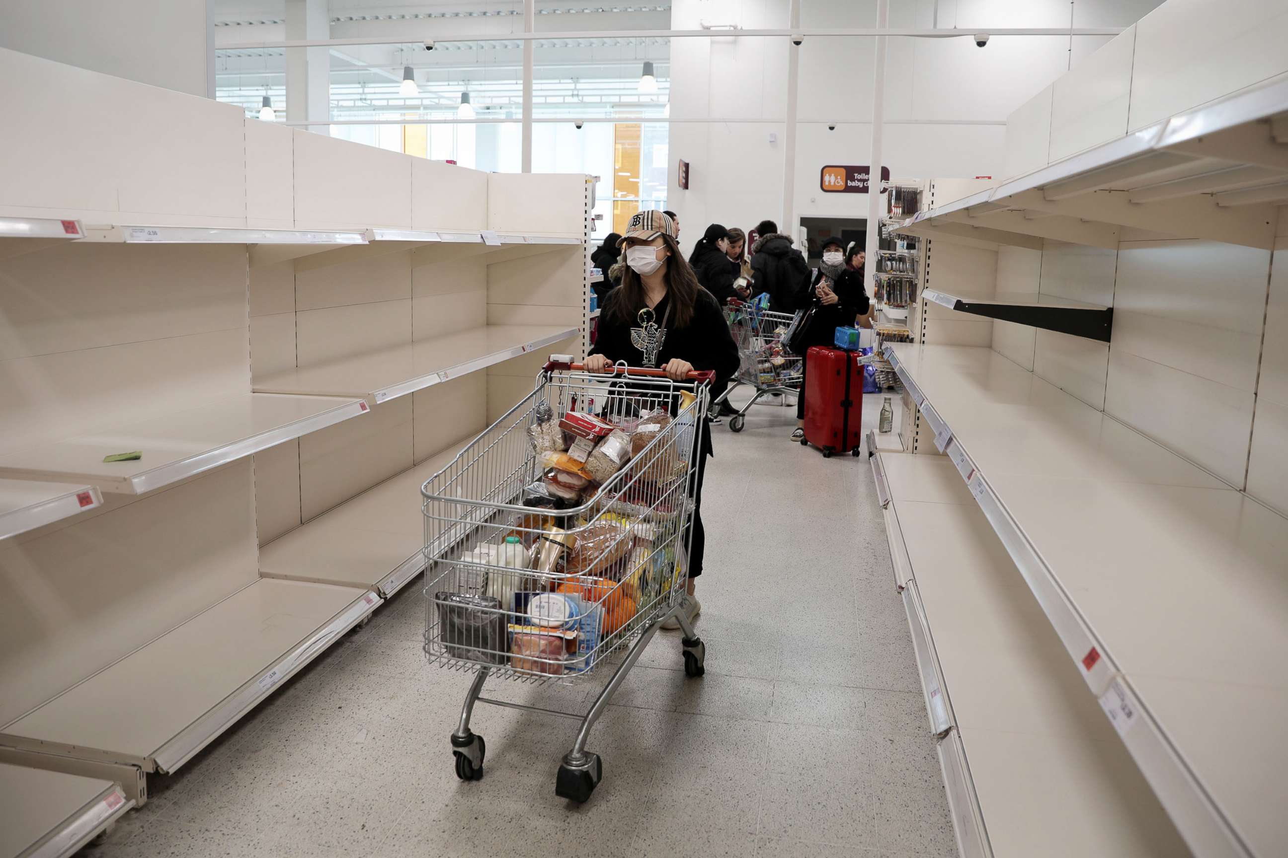 PHOTO: Empty shelves greet shoppers at a supermarket in London, England, March 18, 2020.