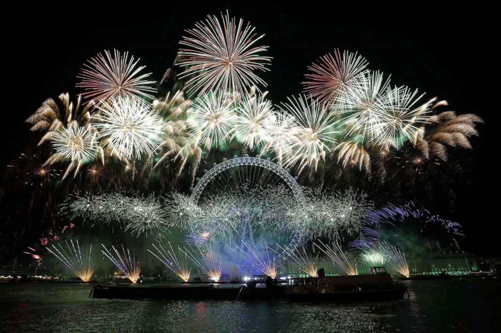 PHOTO: Fireworks explode around the London Eye during New Year's celebrations in central London just after midnight, Jan. 1, 2018. 