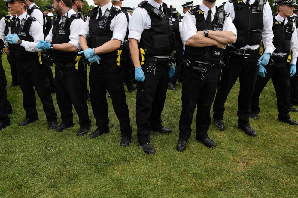PHOTO: Police officers are seen policing an anti-lockdown demonstration in Hyde Park in London, United Kingdom, on May 16, 2020, following an easing of restrictions in England amid the coronavirus pandemic.