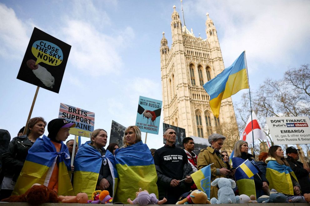 PHOTO: People demonstrating in support of Ukraine gather outside the Houses of Parliament, amid Russia's invasion of Ukraine, in London, Britain, March 27, 2022.