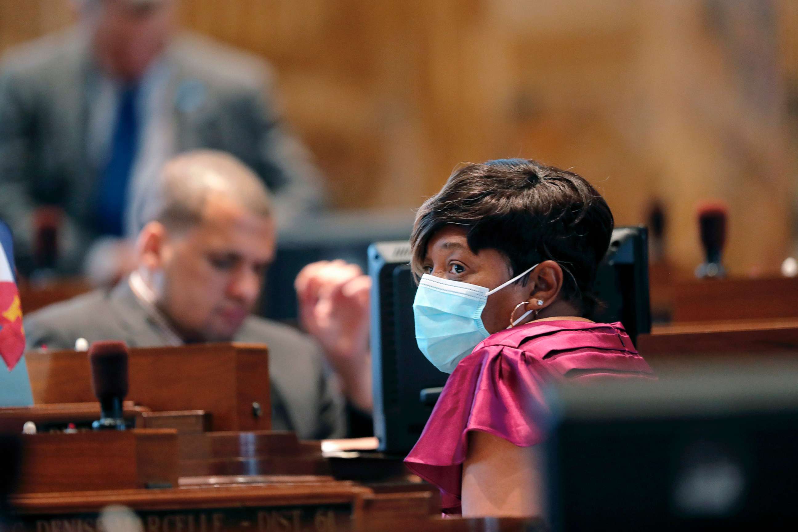 PHOTO: State Rep. Denise Marcelle wears a mask as legislators convene in a limited number while exercising social distancing, due to the new coronavirus pandemic, at the State Capitol in Baton Rouge, La., March 31, 2020.