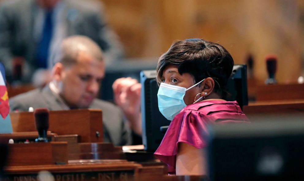 PHOTO: State Rep. Denise Marcelle wears a mask as legislators convene in a limited number while exercising social distancing, due to the new coronavirus pandemic, at the State Capitol in Baton Rouge, La., March 31, 2020.