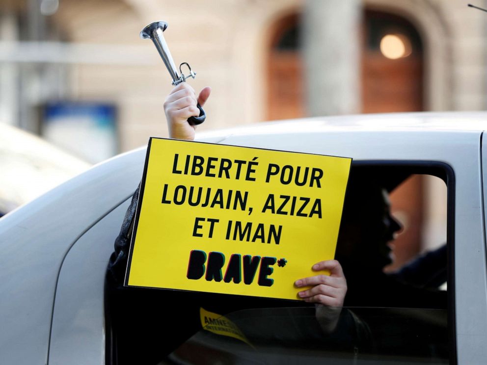PHOTO: A demonstrator holds a placard outside the Saudi Arabian Embassy to protest on International Womens Day to urge Saudi authorities to release jailed womens activists Loujain al-Hathloul, Eman al-Nafjan and Aziza al-Yousef in Paris, March 8, 2019.