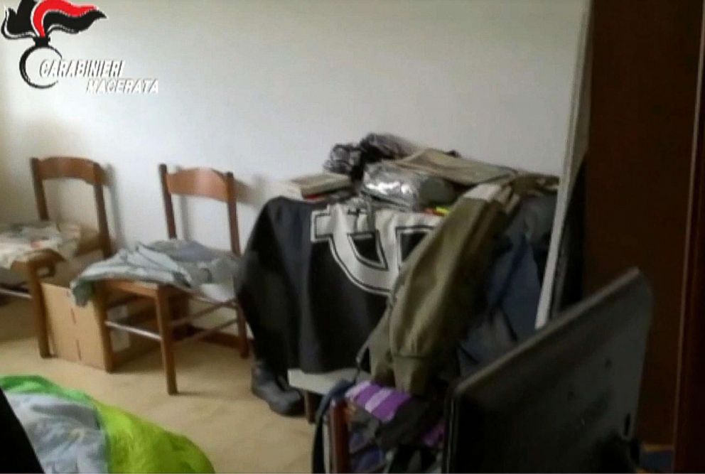 PHOTO: A framegrab from a video made available by the Italian police on Feb. 5, 2018 shows a Celtic cross Neo-Nazi flag at found at Luca Traini's home in Macerata, Italy, Feb. 4 2018.