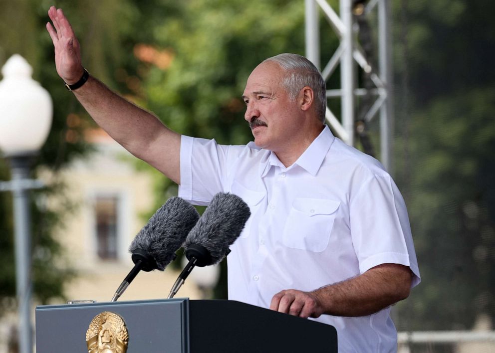 PHOTO: Belarusian President Alexander Lukashenko gestures during a rally in his support in Grodno, Belarus, Saturday, Aug. 22, 2020. 
