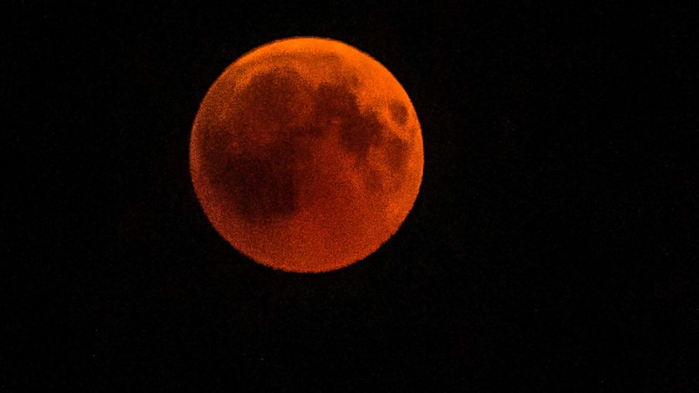 PHOTO: The full moon during a "blood moon" eclipse as seen from Cairo, July 27, 2018.
