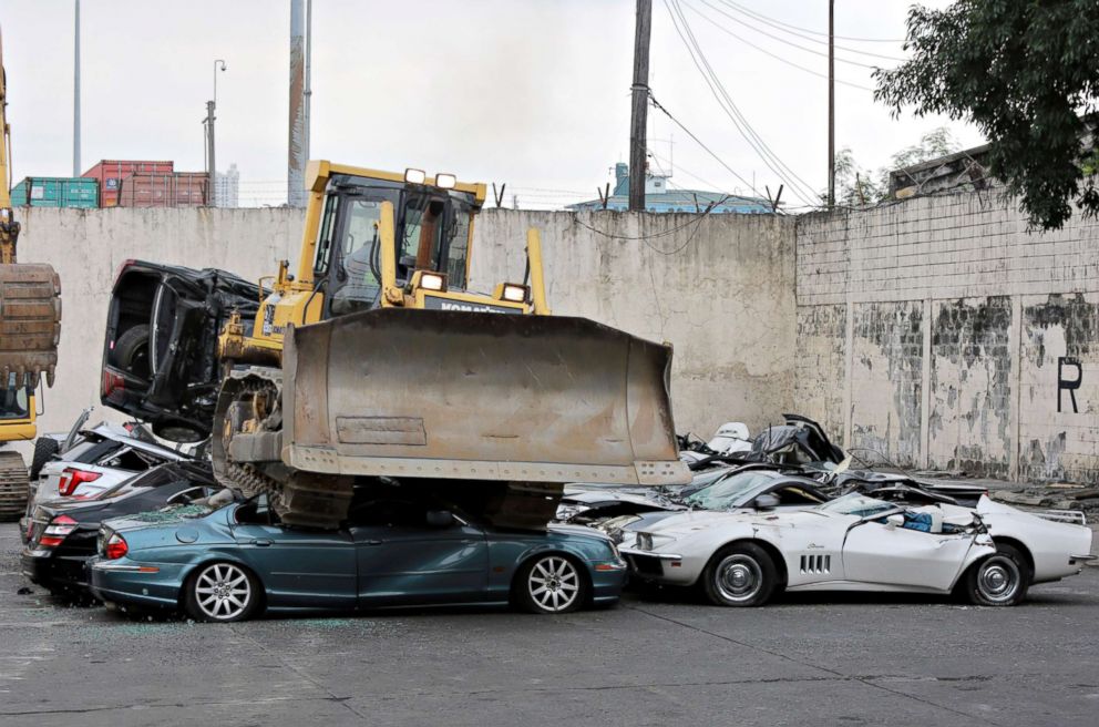 Strongman Rodrigo Duterte switches gears to destroy luxury cars in his