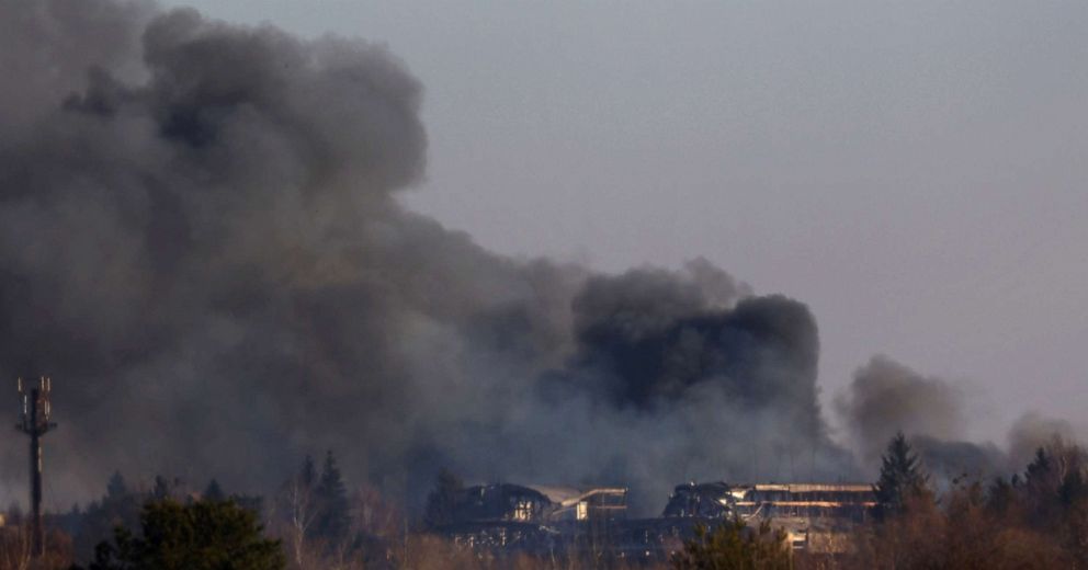 PHOTO: Smoke rises from a factory building near Lviv airport, in Lviv, Ukraine, March 18, 2022. 
