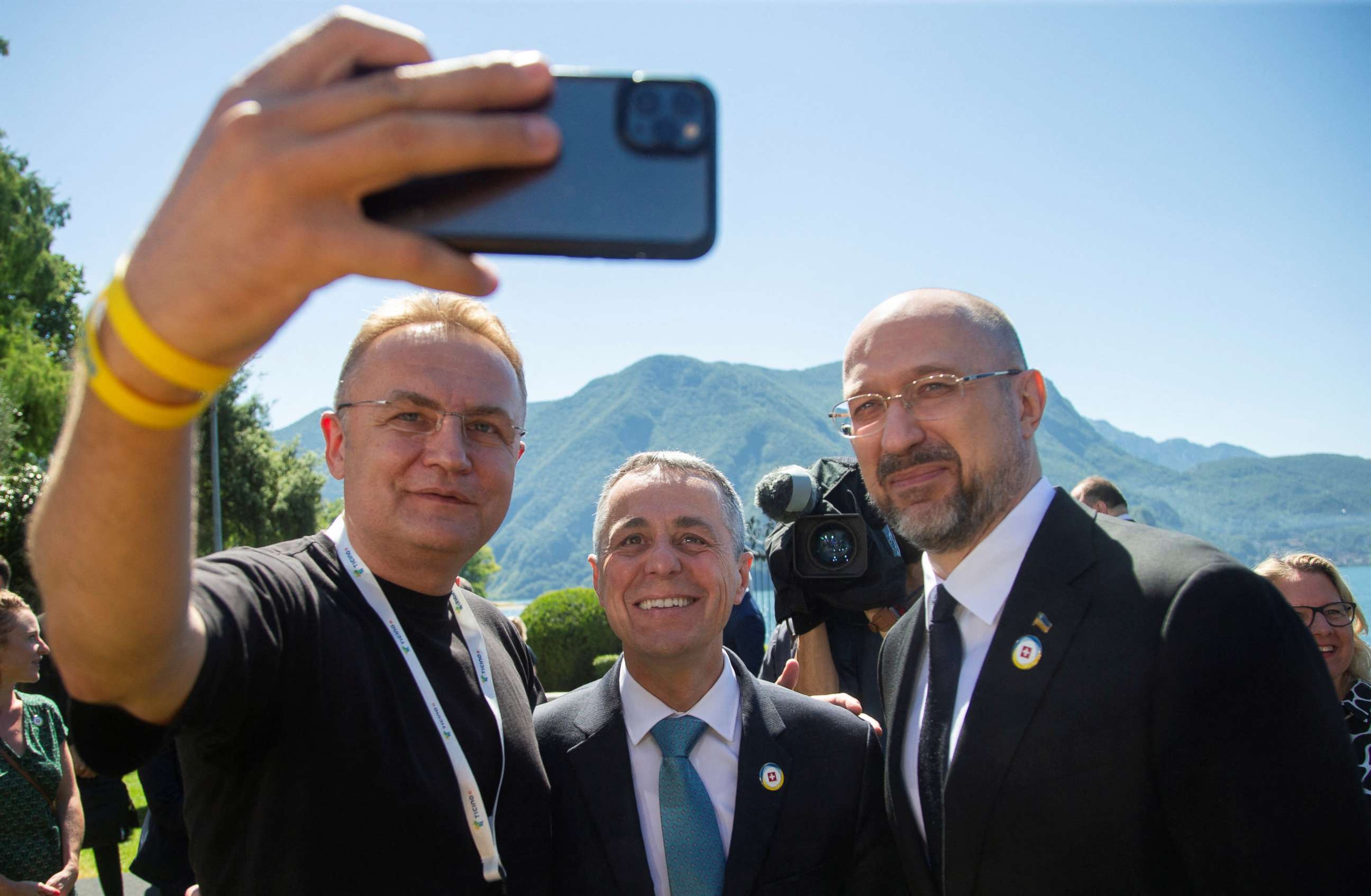 PHOTO: Andriy Sadovyi, Mayor of Lviv, left, poses with Swiss President Ignazio Cassis, Minister of Foreign Affairs, center, and Ukrainian Prime Minister Denys Shmyhal, in Lugano, Switzerland, on July 5, 2022.