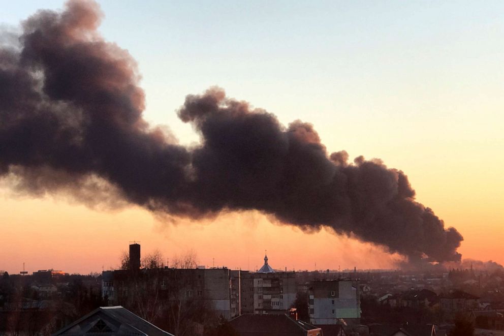 PHOTO: A cloud of smoke raises after an explosion in Lviv, western Ukraine, March 18, 2022. The mayor of Lviv says missiles struck near the city's airport early Friday.