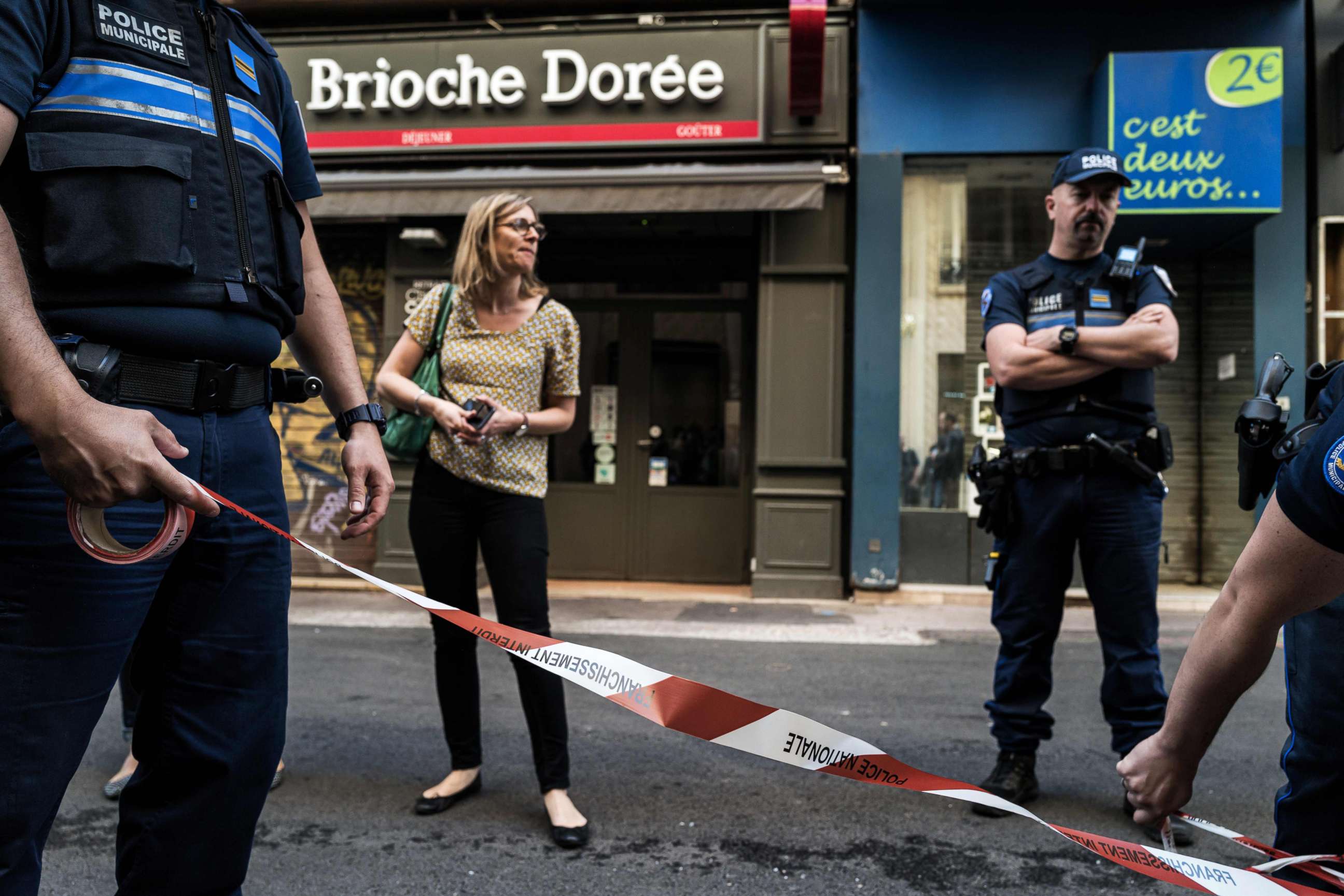 PHOTO: Police officers set a perimeter in front a 'Brioche doree' bakery before French Mayor of Lyon's visit, May 25, 2019, the day after a suspected package bomb blast.