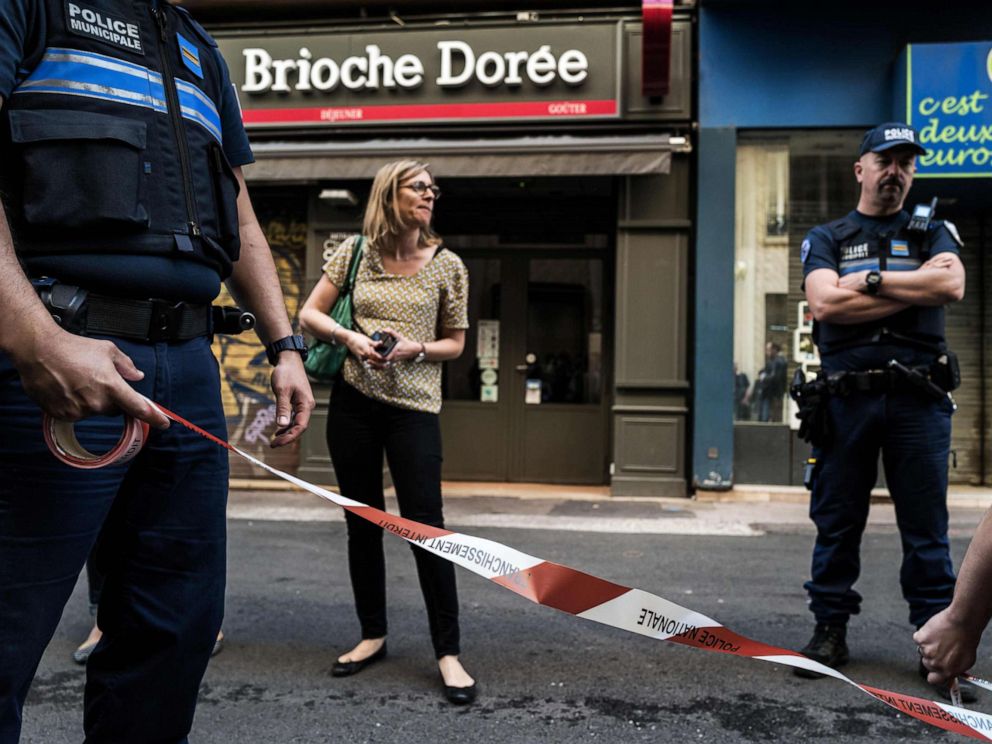 PHOTO: Police officers set a perimeter in front a Brioche doree bakery before French Mayor of Lyons visit, May 25, 2019, the day after a suspected package bomb blast.