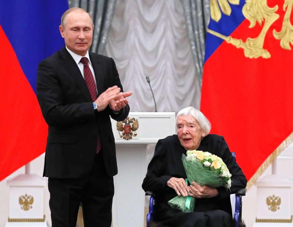 PHOTO: Russian President Vladimir Putin, left, congratulates the Moscow Helsinki Group Chair and human rights activist Lyudmila Alexeyeva, during a ceremony in the Kremlin in Moscow.