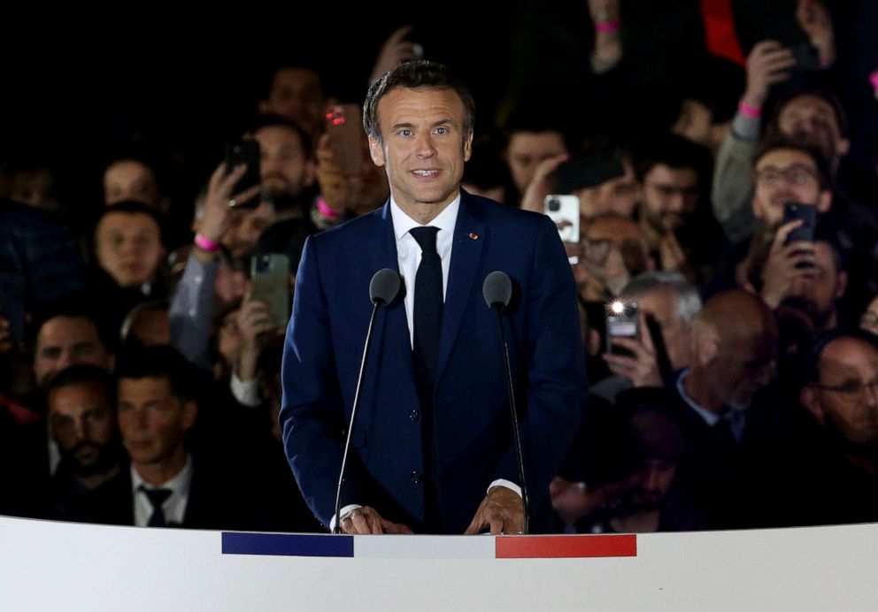 PHOTO: French President Emmanuel Macron celebrates his re-election at the Champ de Mars near the Eiffel Tower on April 24, 2022, in Paris.