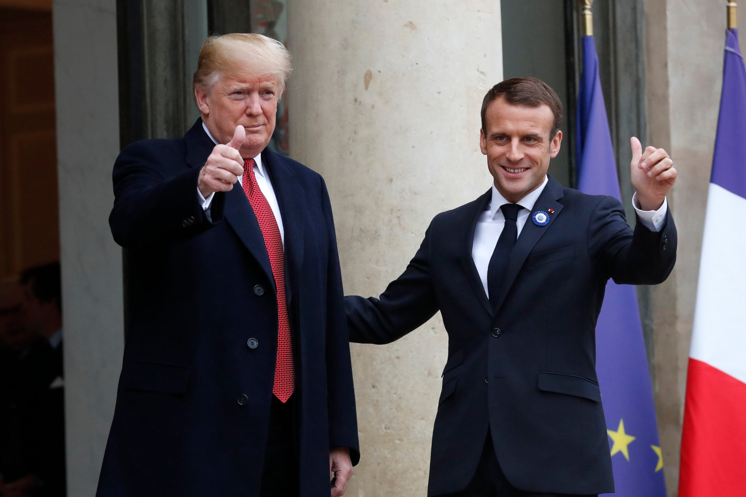 PHOTO: French President Emmanuel Macron, right, and U.S President Donald Trump thumb up at the Elysee Palace in Paris, Saturday, Nov.10, 2018.