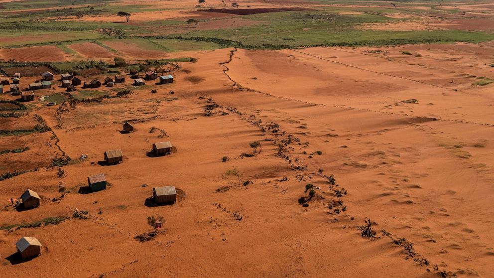 PHOTO: Sand begins to surround houses close to the town of Ambovombe, Androy region, Madagascar, Feb. 15, 2022.