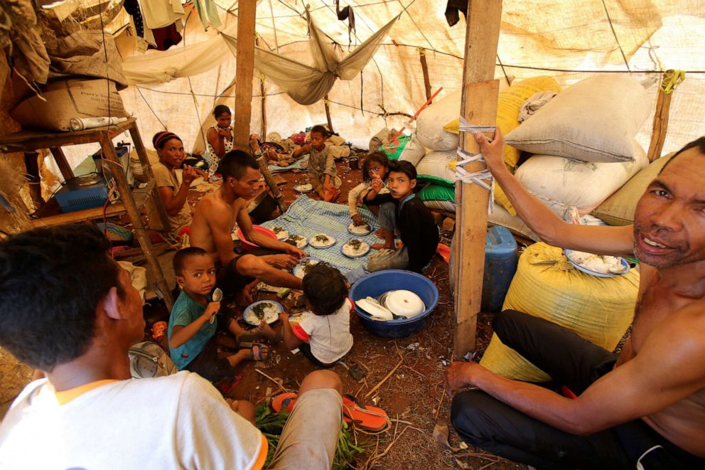 PHOTO: People whose homes have been destroyed by tropical storm Ana find shelter under plastic sheeting in Antananarivo, Madagascar, Jan. 26, 2022.