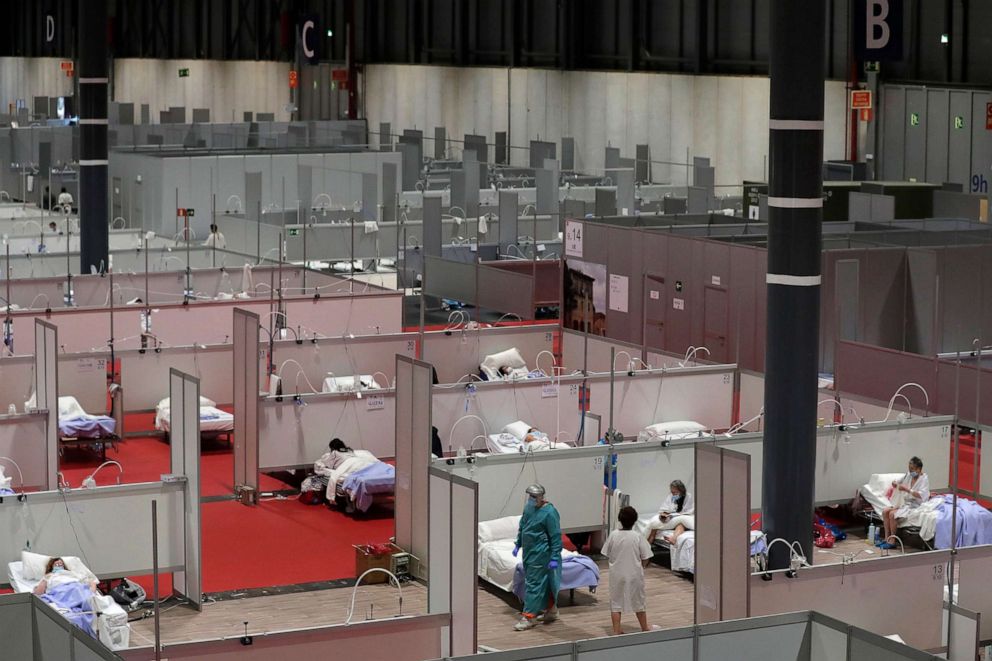 PHOTO: Patients fill a temporary field hospital set at Ifema convention and exhibition in Madrid, Spain, April 2, 2020.